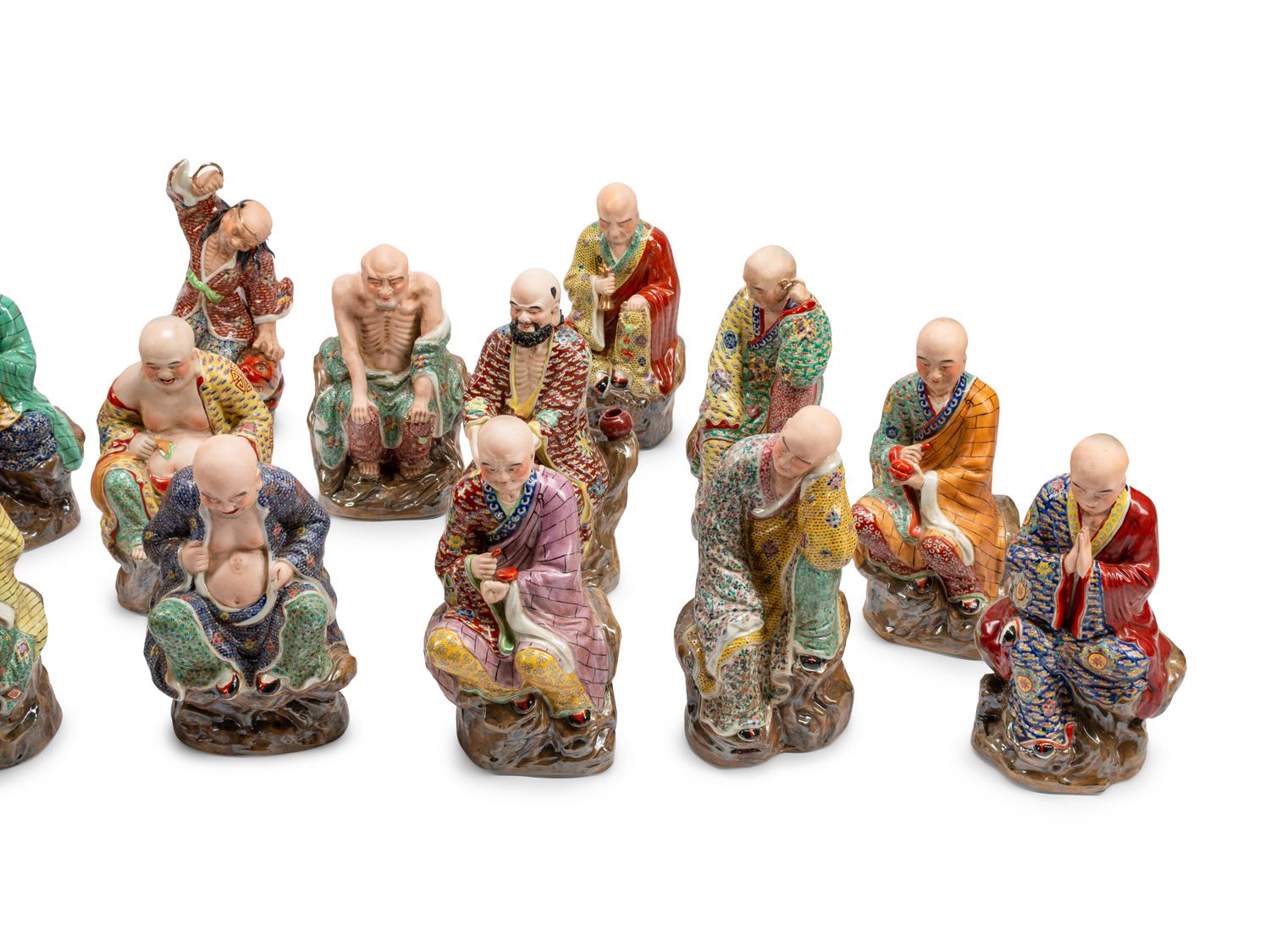 A Set of Eighteen Chinese Export Enameled Porcelain Figures of Immortals
