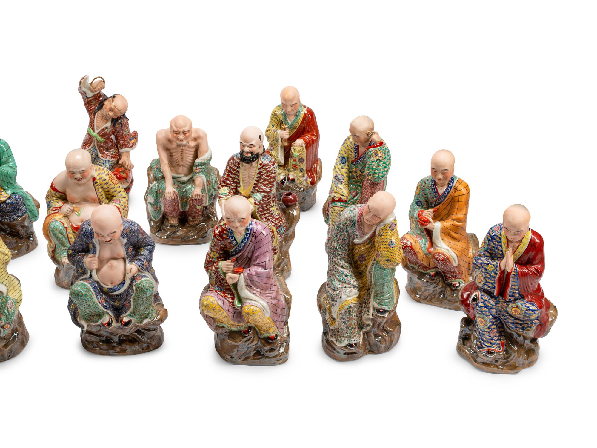 A Set of Eighteen Chinese Export Enameled Porcelain Figures of Immortals