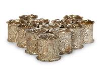 Twelve American Repoussé Silver Napkin Rings