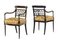 A Pair of Regency Style Gilt and Black Lacquered Armchairs