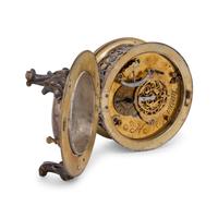 A German Gilt Metal and Silvered Brass Table Clock