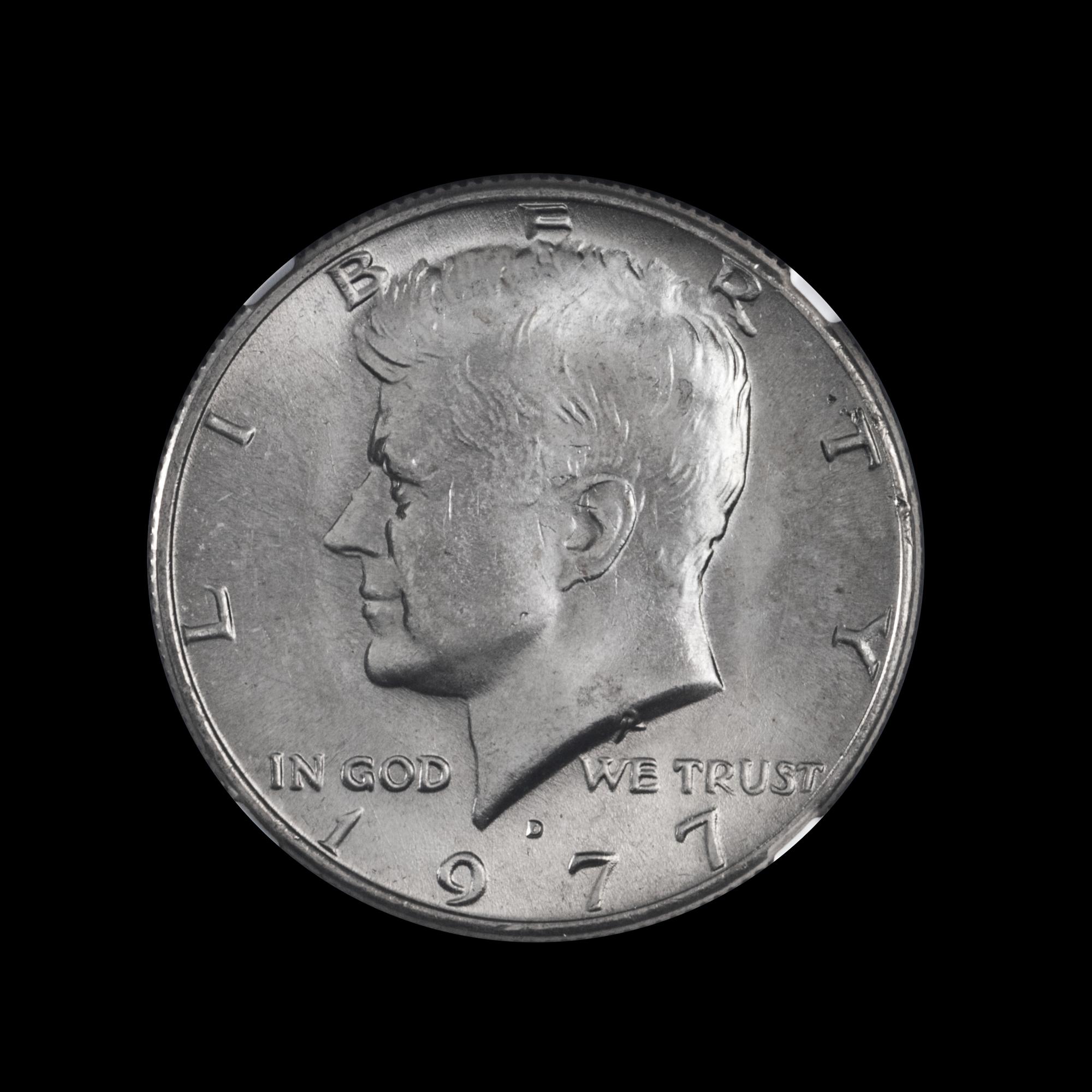 A United States 1977-D Kennedy 50c Coin — NGC GRADED MS65