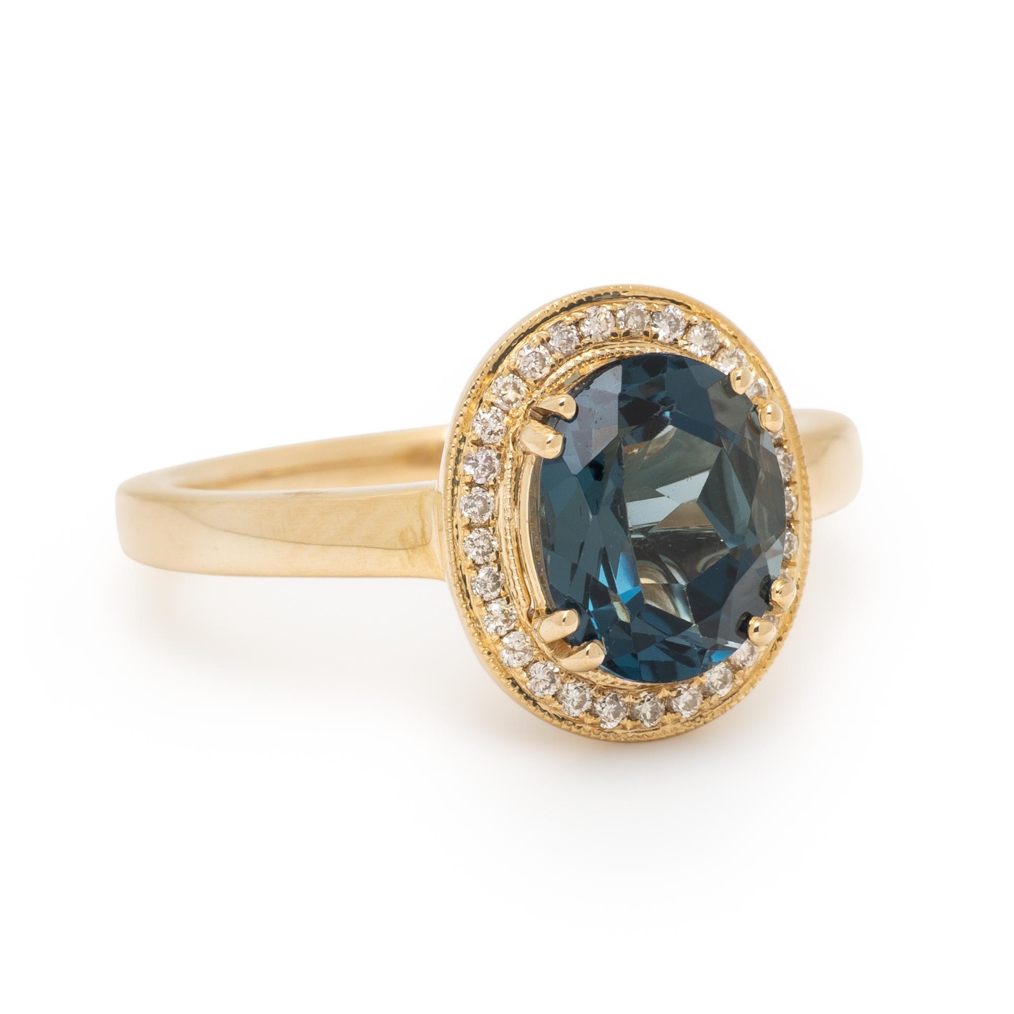 BLUE TOPAZ AND DIAMOND RING