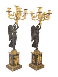 A Pair of Empire Ormolu and Patinated Bronze Figural Five-Light Candelabra