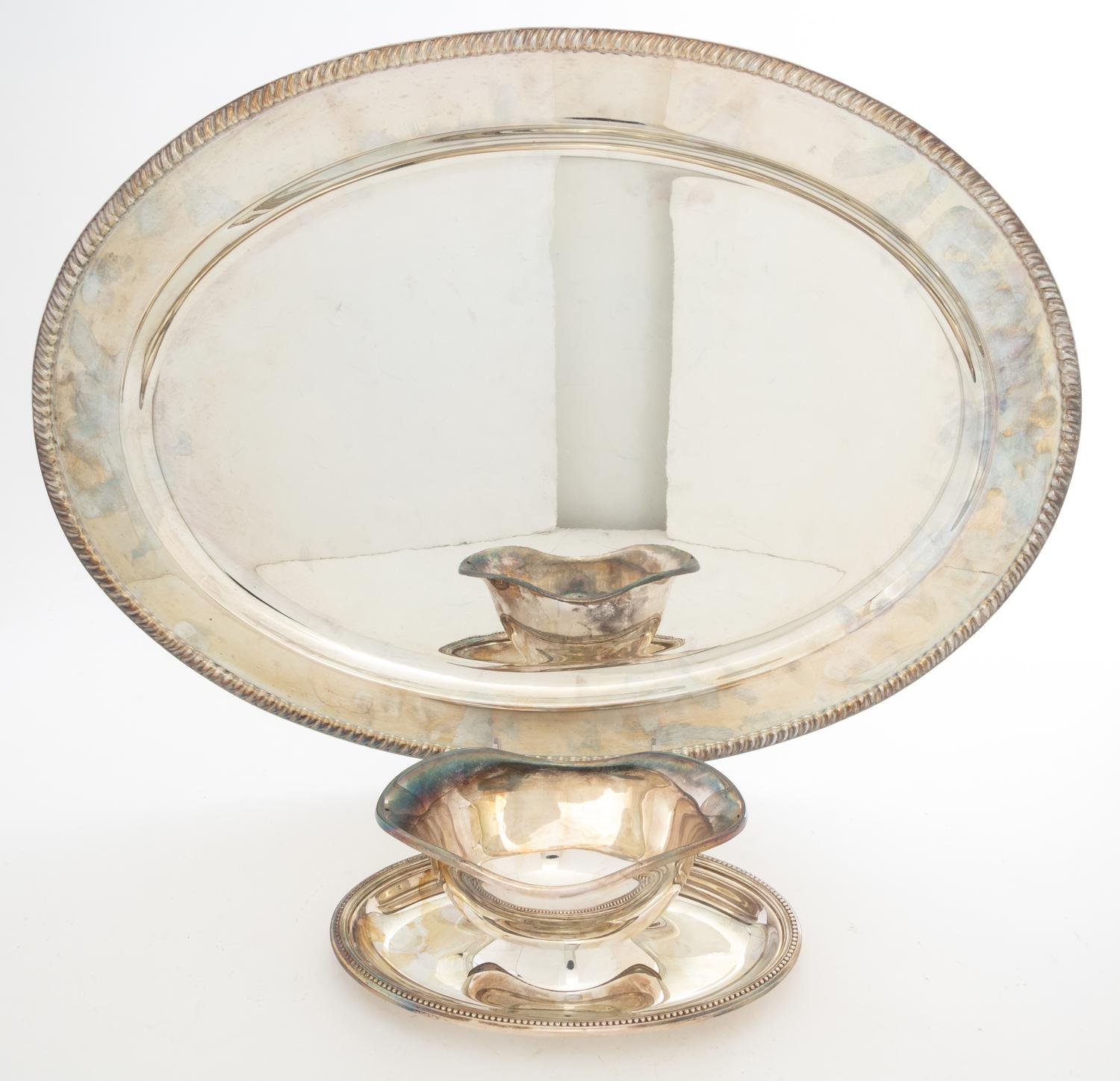 Two Silver-Plate Table Articles Length of tray 22 inches.