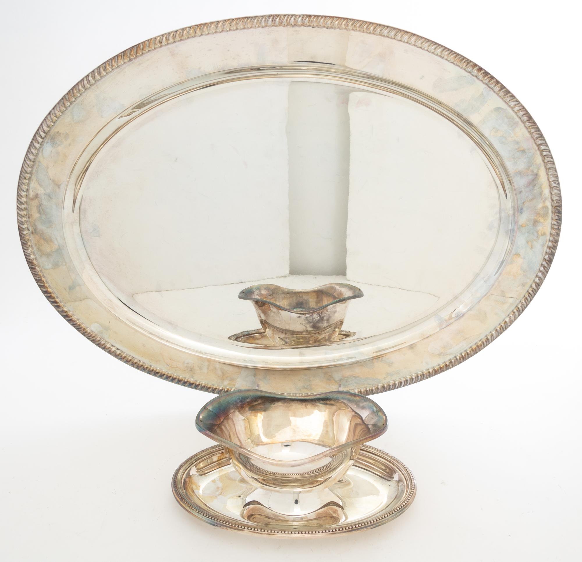 Two Silver-Plate Table Articles Length of tray 22 inches.