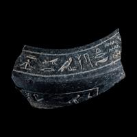 An Egyptian Granite Vessel Fragment with Hieroglyphs