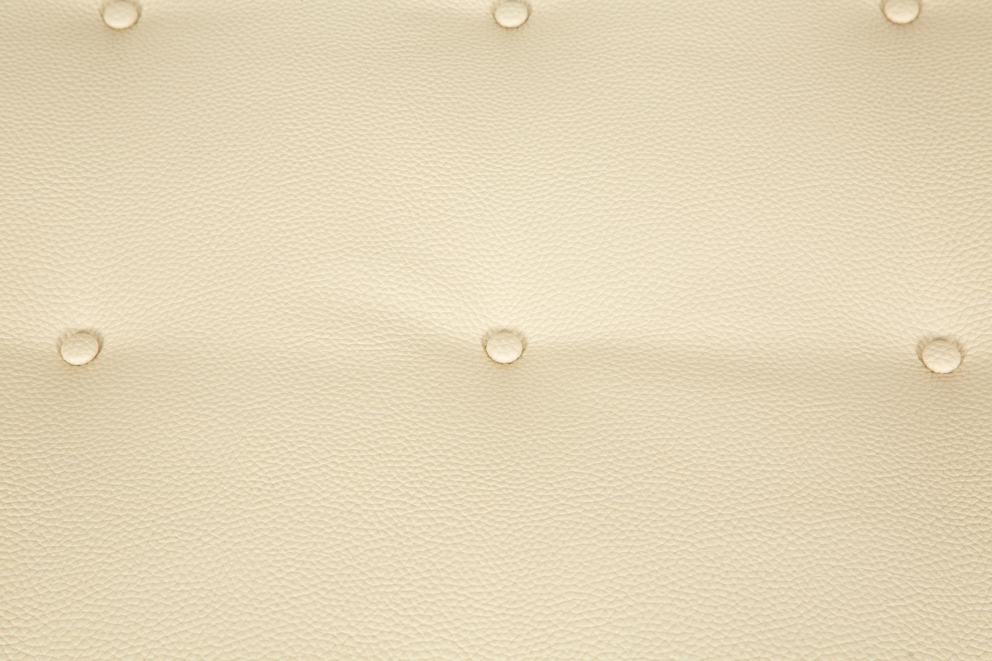 A Contemporary Embossed Leather Ottoman
