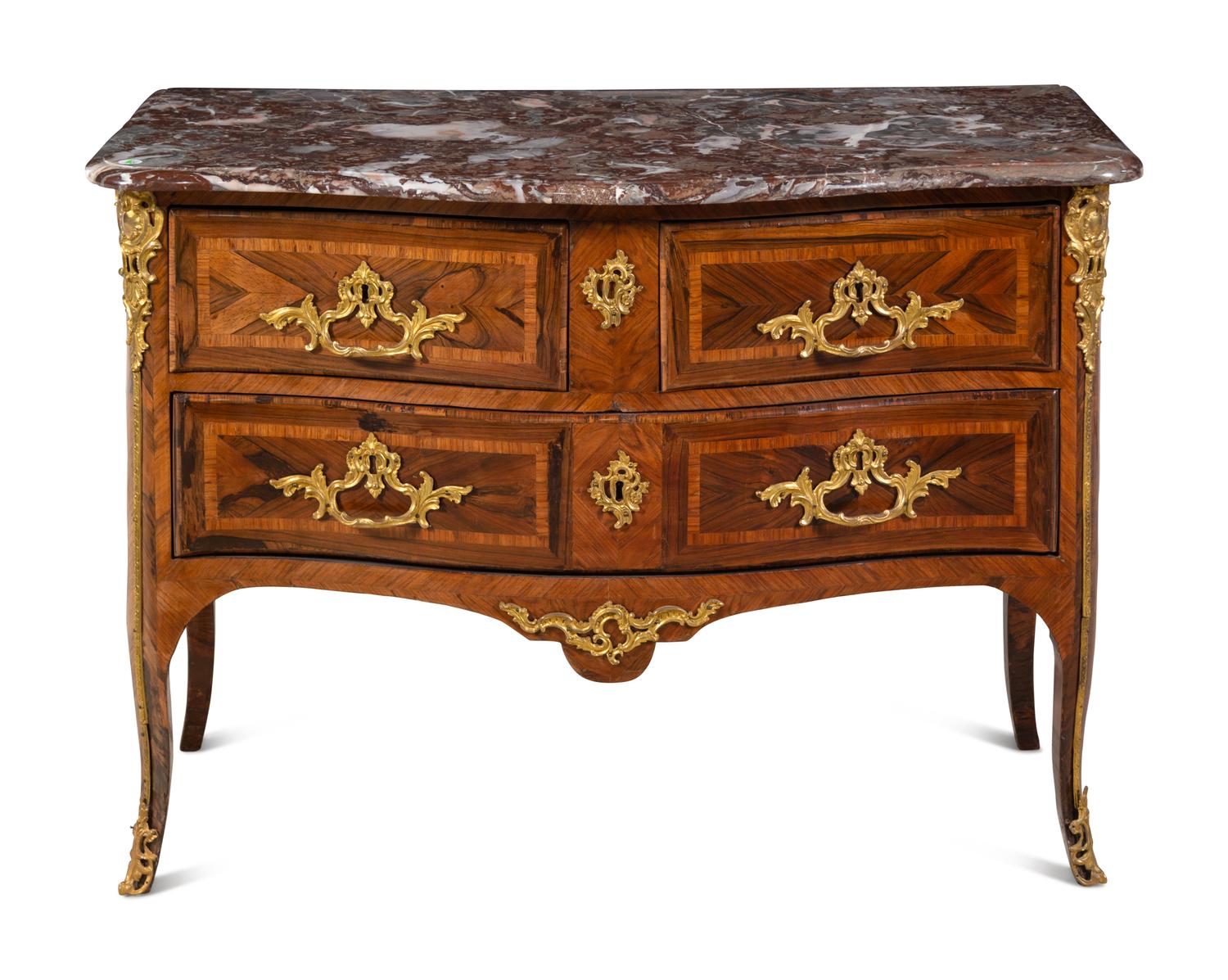 A Régence Gilt Bronze Mounted Marble-Top Commode