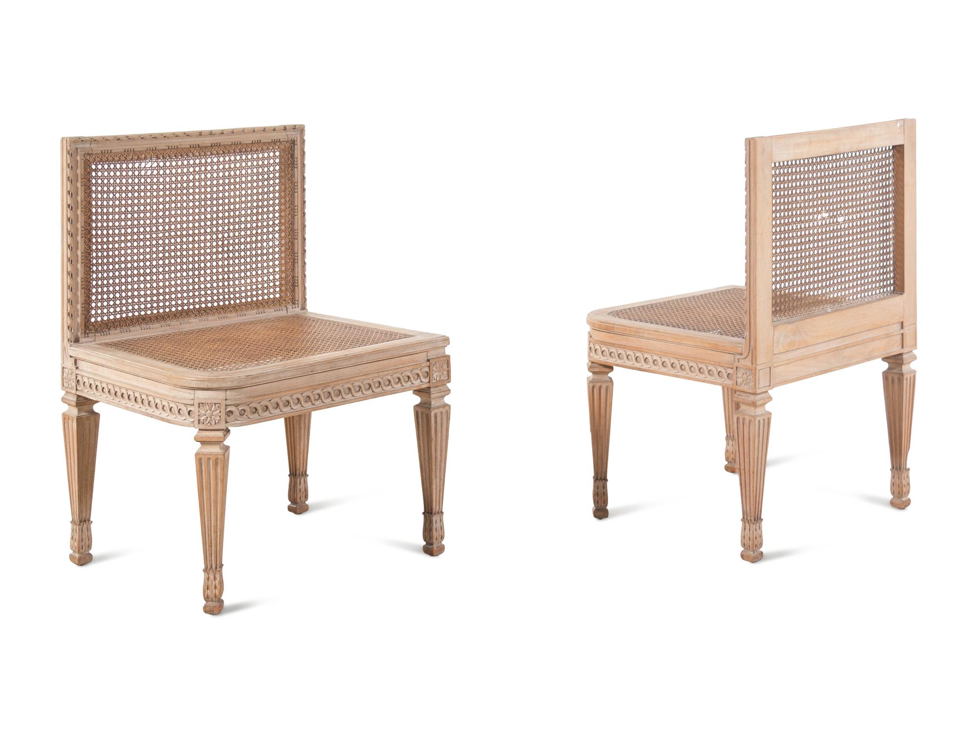 A Pair of Louis XVI Style Caned Slipper Chairs