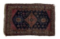 A Persian Wool Rug 3 feet 11 inches x 2 feet 6 1/2 inches.