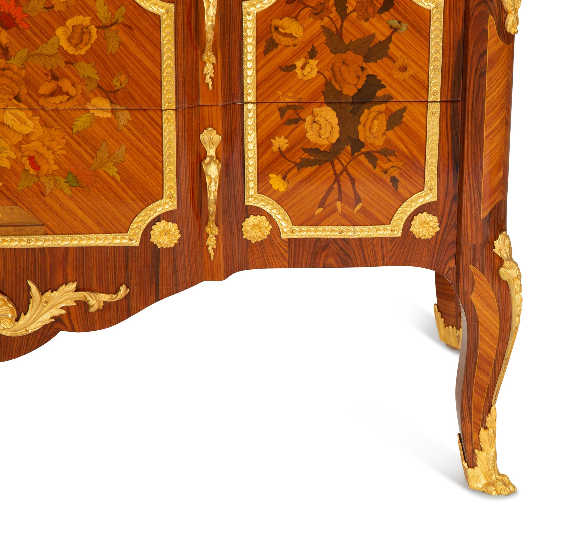 A Pair of Louis XV/XVI Transitional Style Gilt Bronze Mounted Marquetry Marble-Top Commodes