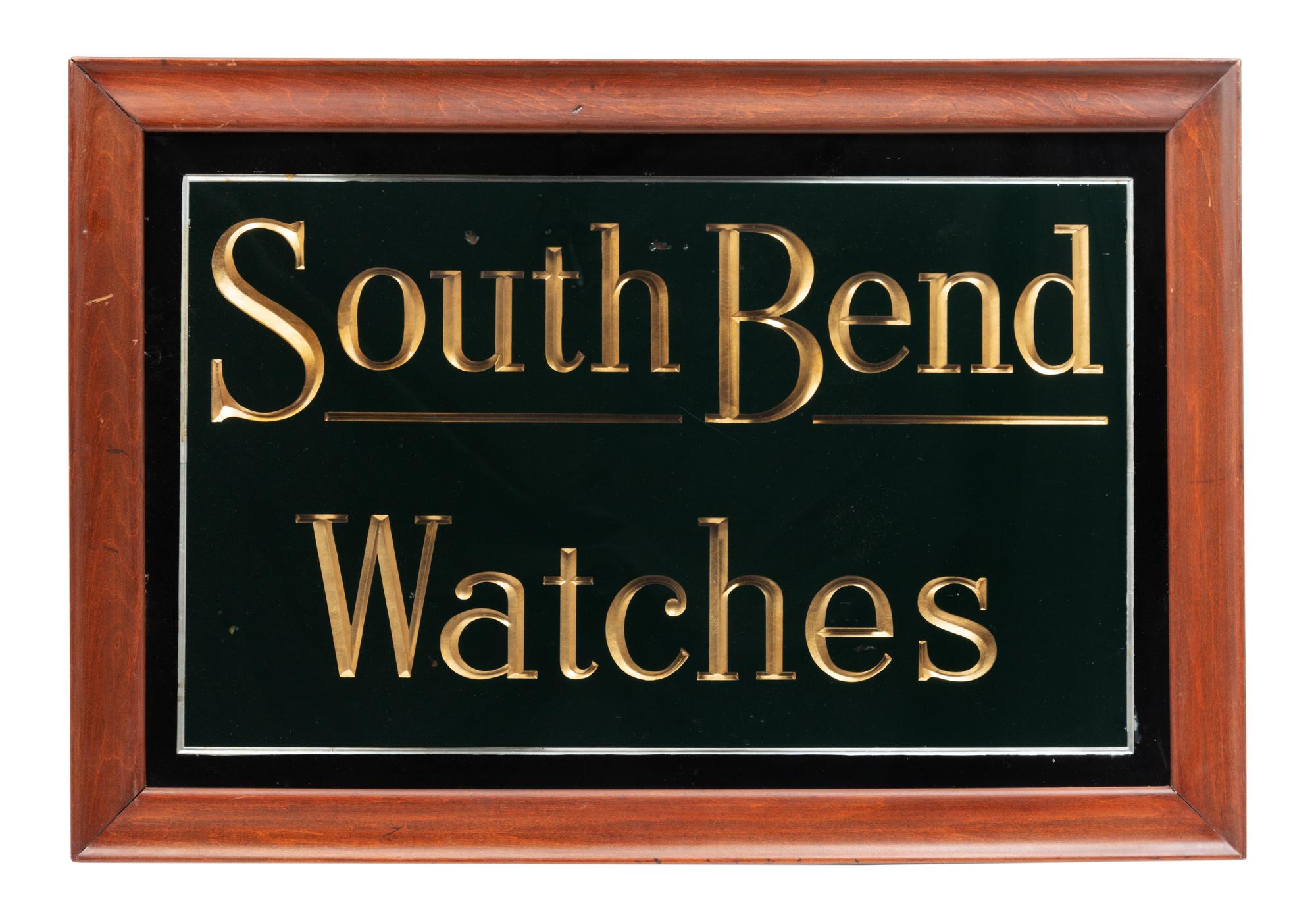 A Reverse Paint and Parcel Gilt South Bend Watches Advertising Sign