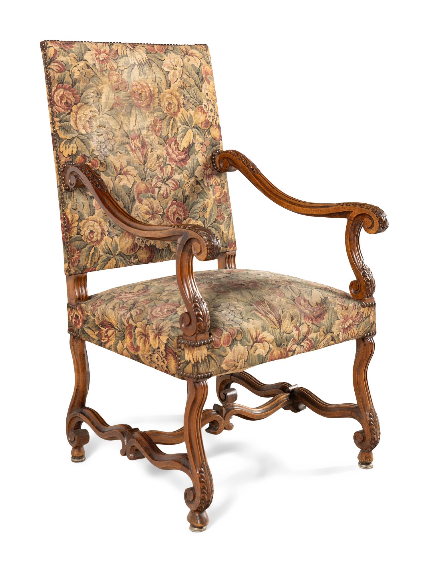 A Louis XIII Style Carved Walnut Armchair