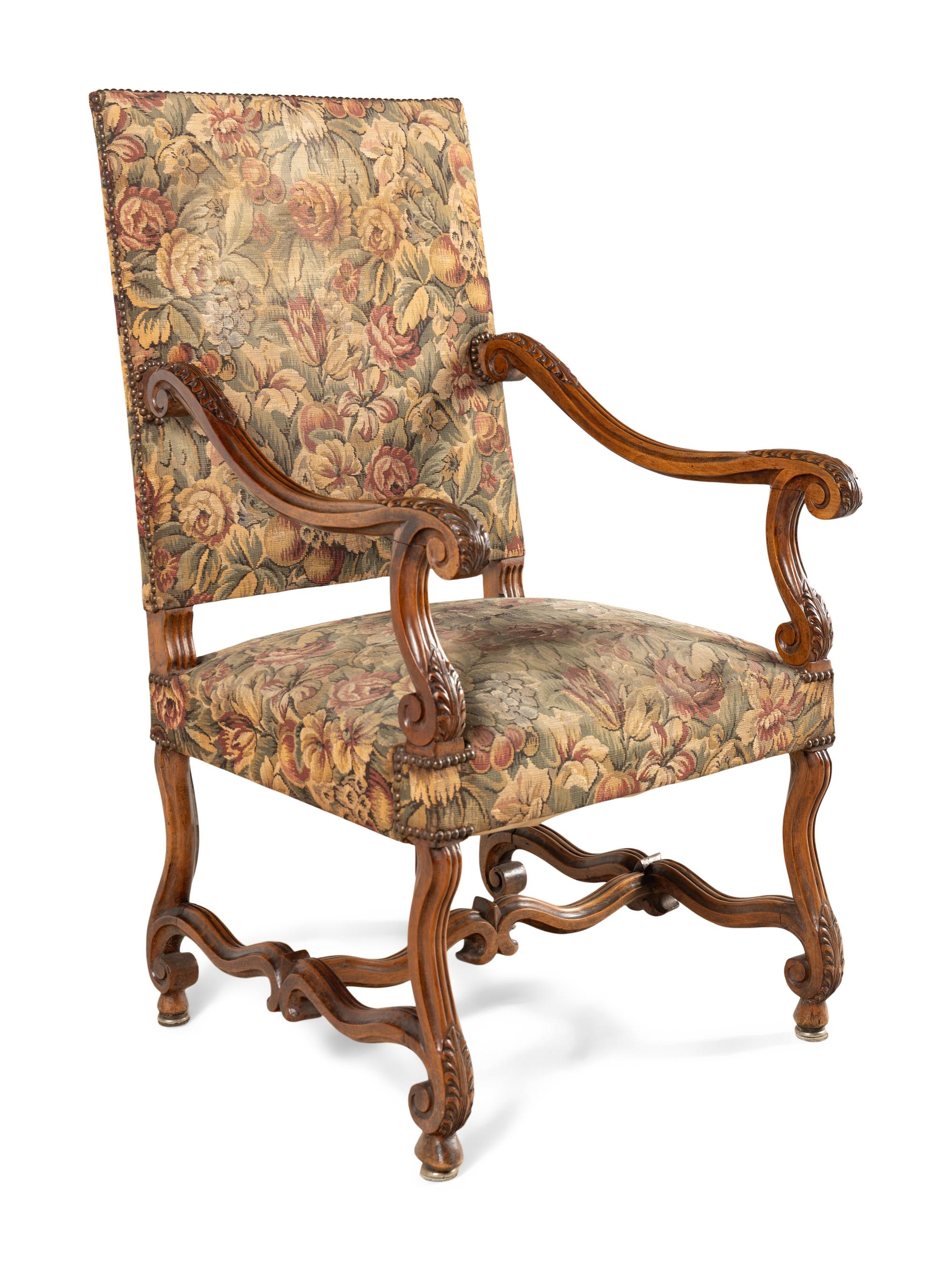 A Louis XIII Style Carved Walnut Armchair
