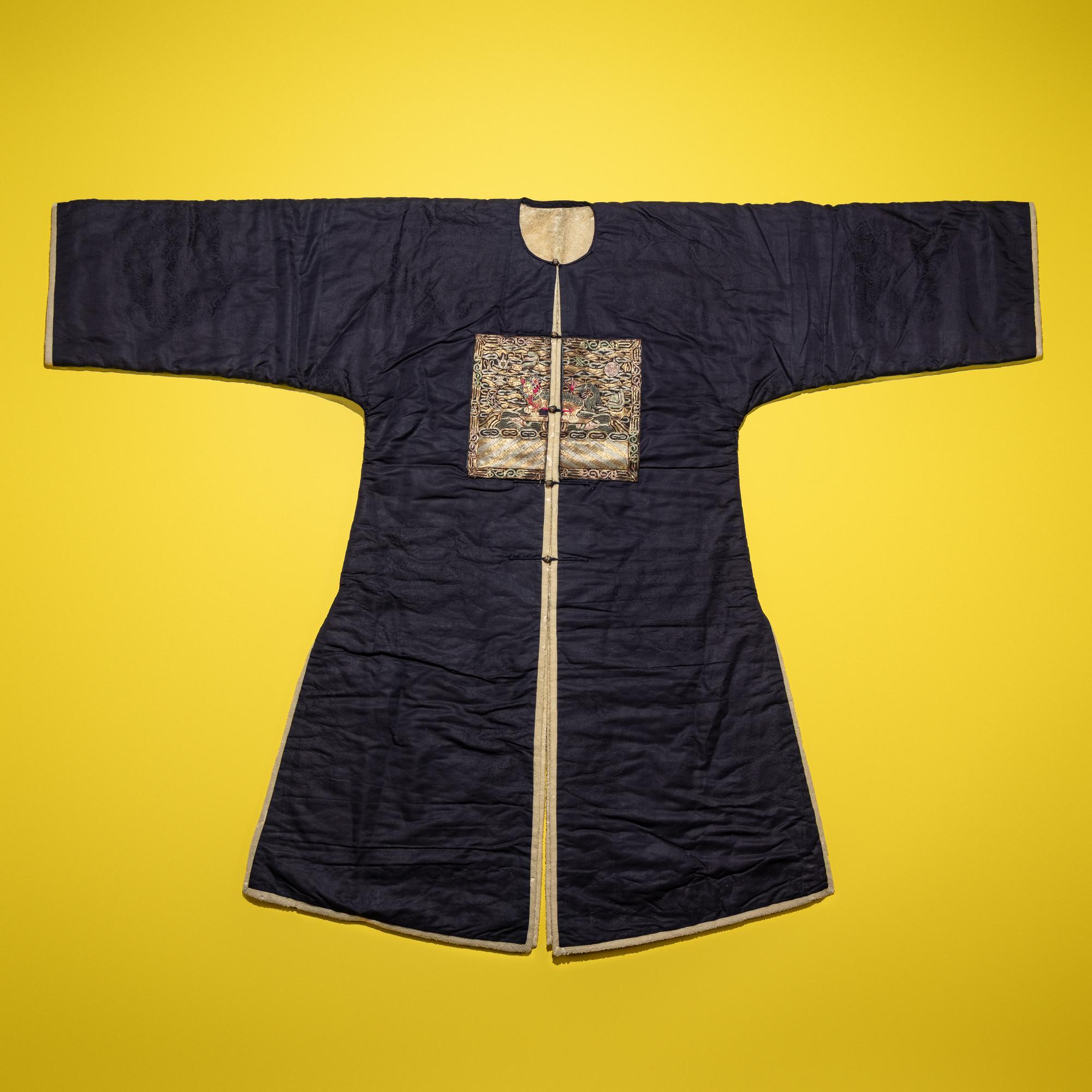 A Chinese Dark Blue Silk Fur Lined Official's Robe, Bufu , Late Qing Dynasty — 清晚期 石青地四品武官冬補服