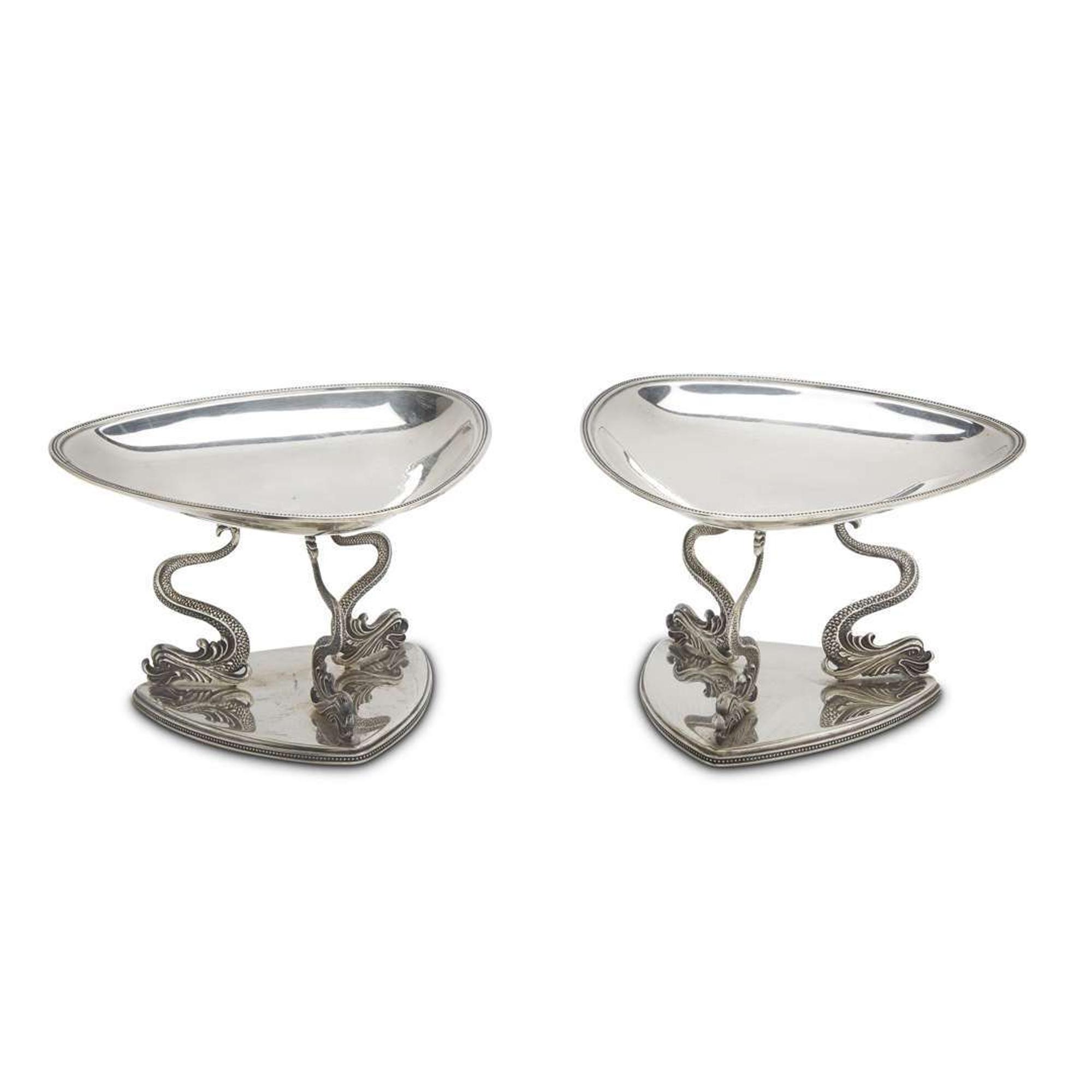 Pair of sterling silver tazze with dolphin form feet 20th century