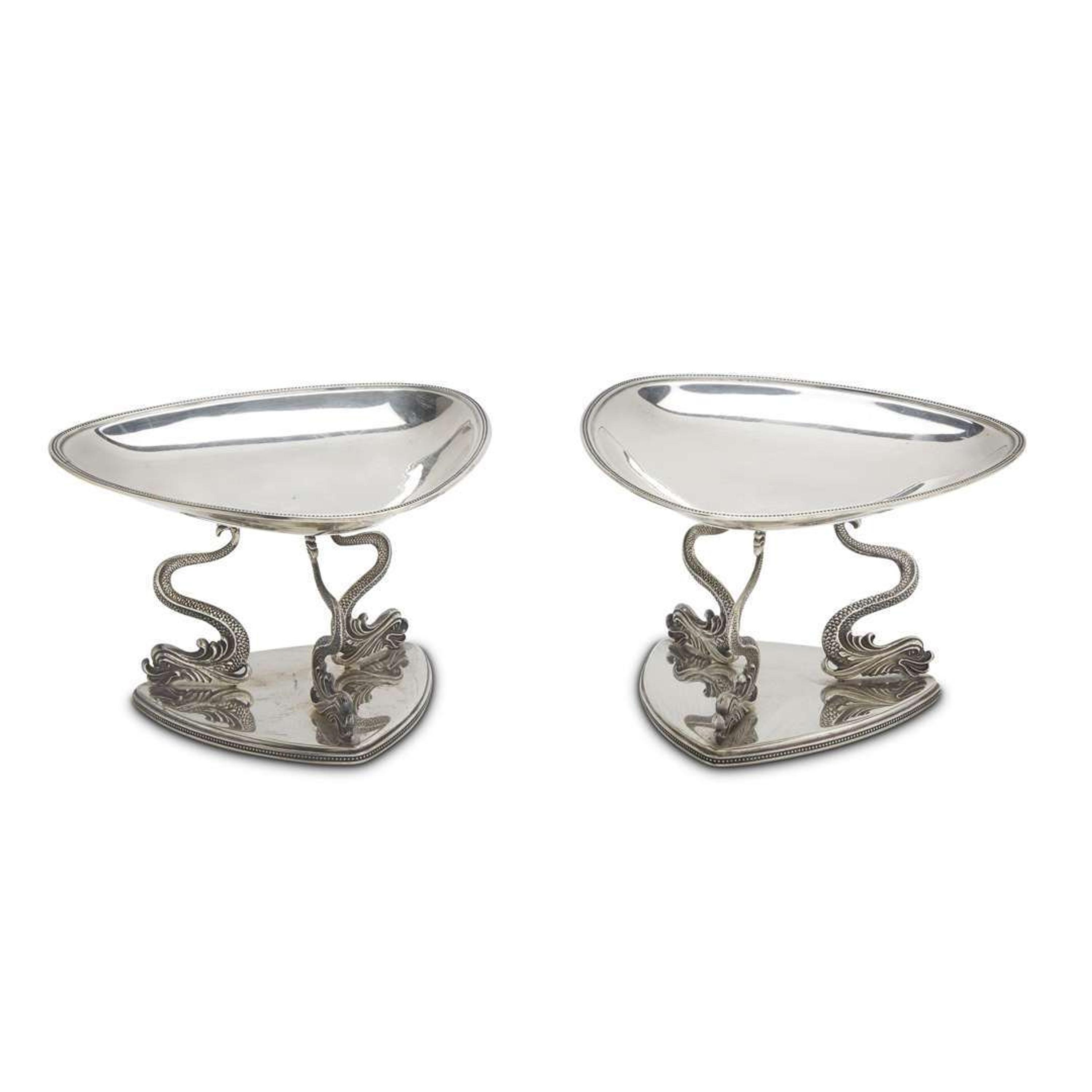 Pair of sterling silver tazze with dolphin form feet 20th century