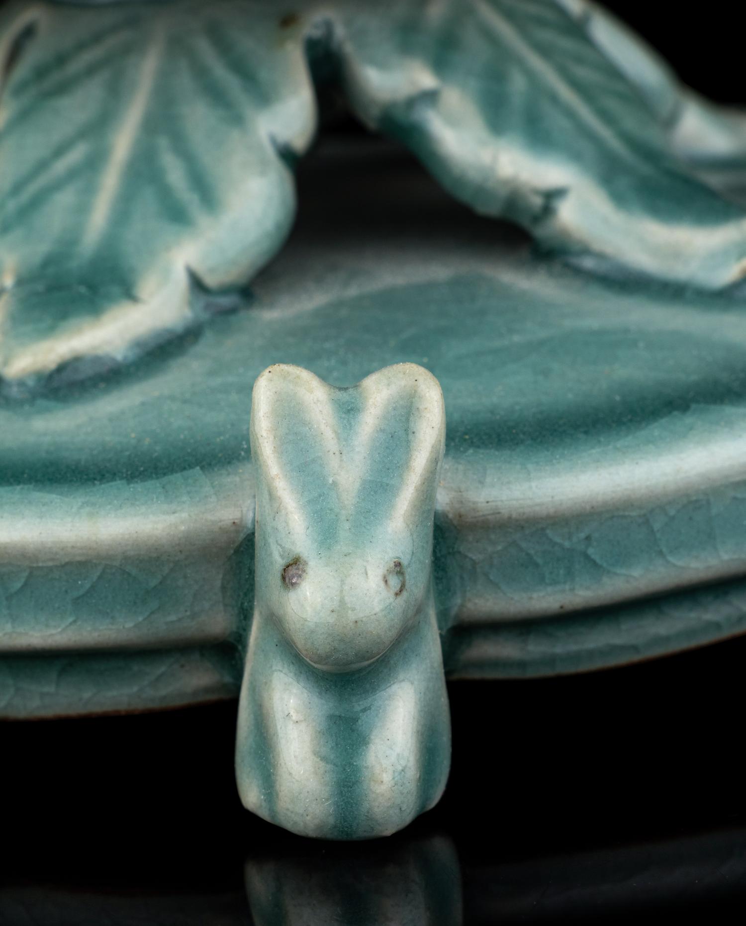 A Korean Celadon Glazed Porcelain 'Lotus' Incense Burner