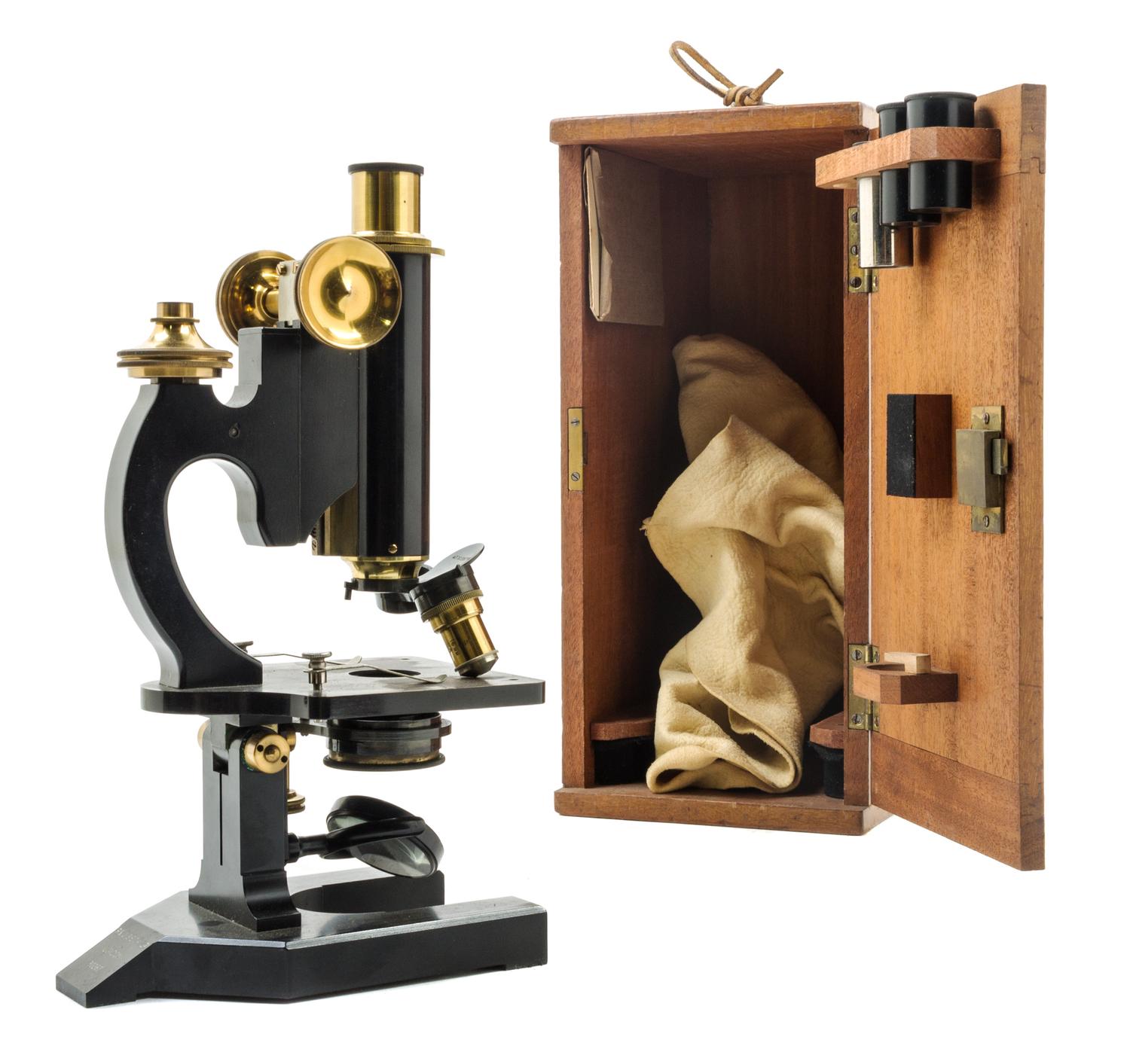 An English Brass and Black Lacquered Microscope Height 11 inches. — R. & J. BECK LTD., LONDON, EARLY 20TH CENTURY