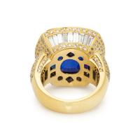 DE HAGO, YELLOW GOLD, TANZANITE, AND DIAMOND RING