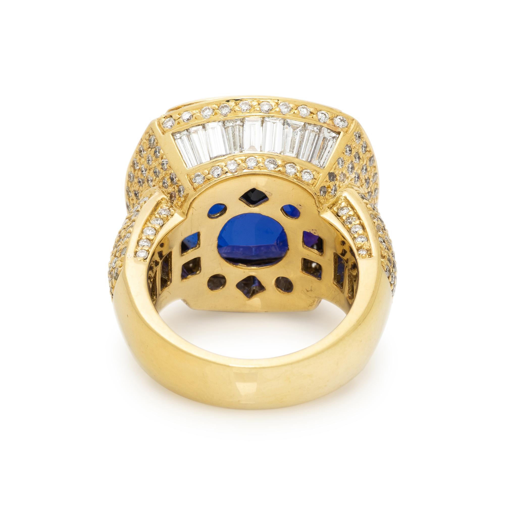 DE HAGO, YELLOW GOLD, TANZANITE, AND DIAMOND RING