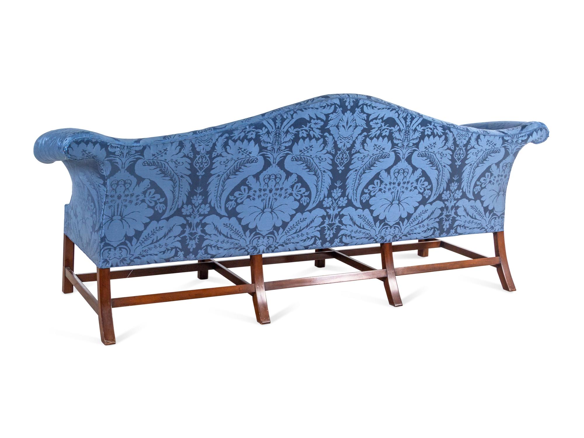 A Kittinger George III Style Fluted Mahogany Camelback Sofa