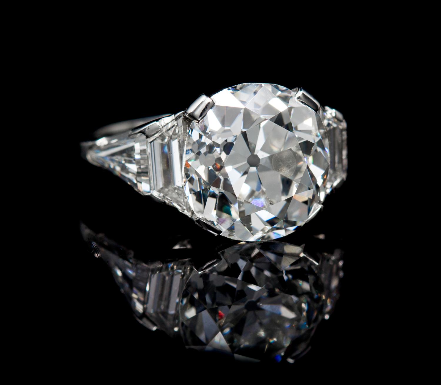 A Platinum and Antique Cushion Cut Diamond Ring, 4.80 dwts.