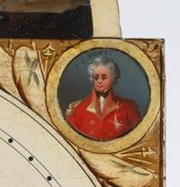 A Regency Brass Inlaid Mahogany Longcase Clock with an Animated Dial