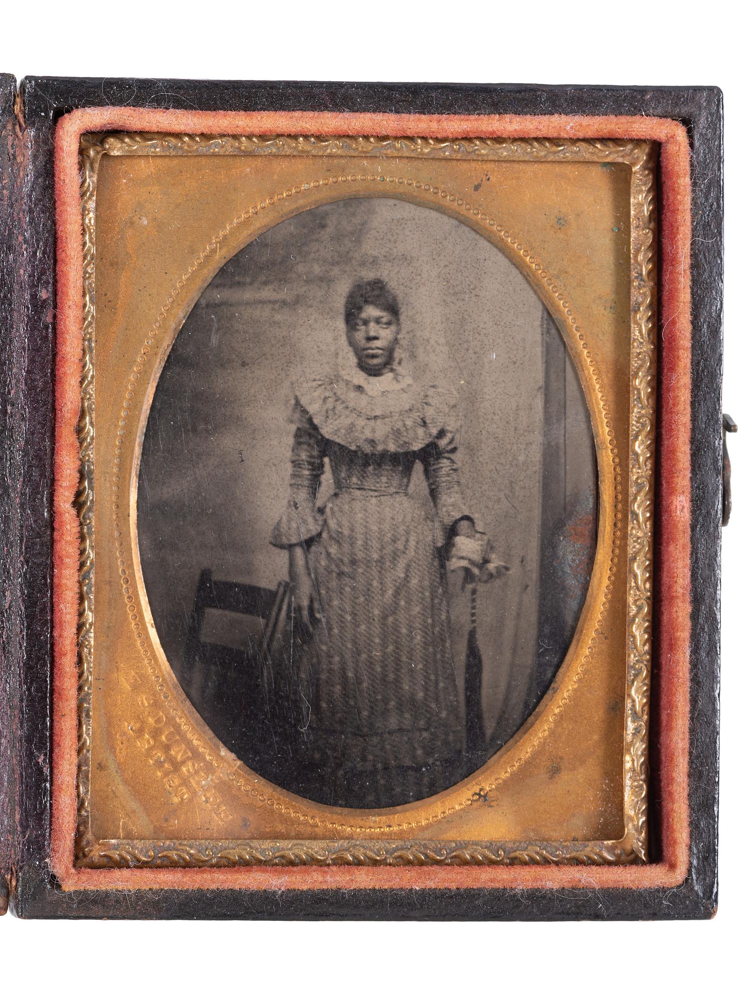 [EARLY PHOTOGRAPHY]. A pair of ninth plate tintypes of African American women.