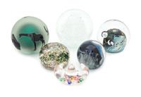 A Group of Six Glass Paperweights Diameter of largest 3 1/2 inches