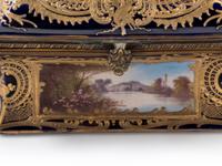 A Sèvres Style Painted and Parcel Gilt Porcelain Table Casket