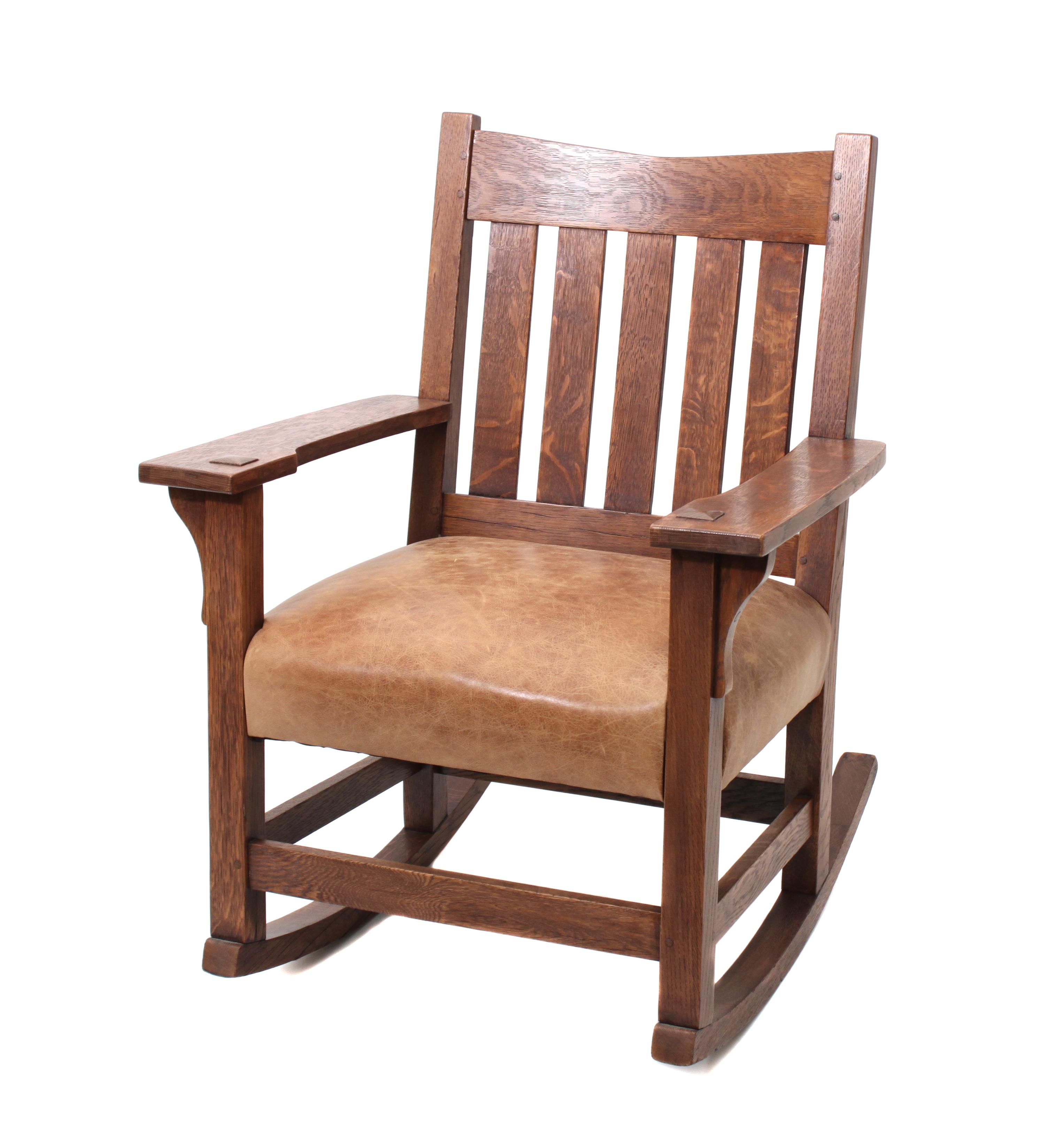 A Gustave Stickley V Back Rocker, Model 311, Height 34 x width 26 x depth 21 inches