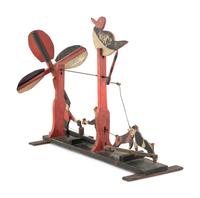 A Carved and Painted Whirligig