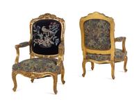 A Pair of Louis XV Style Carved Giltwood Fauteuils