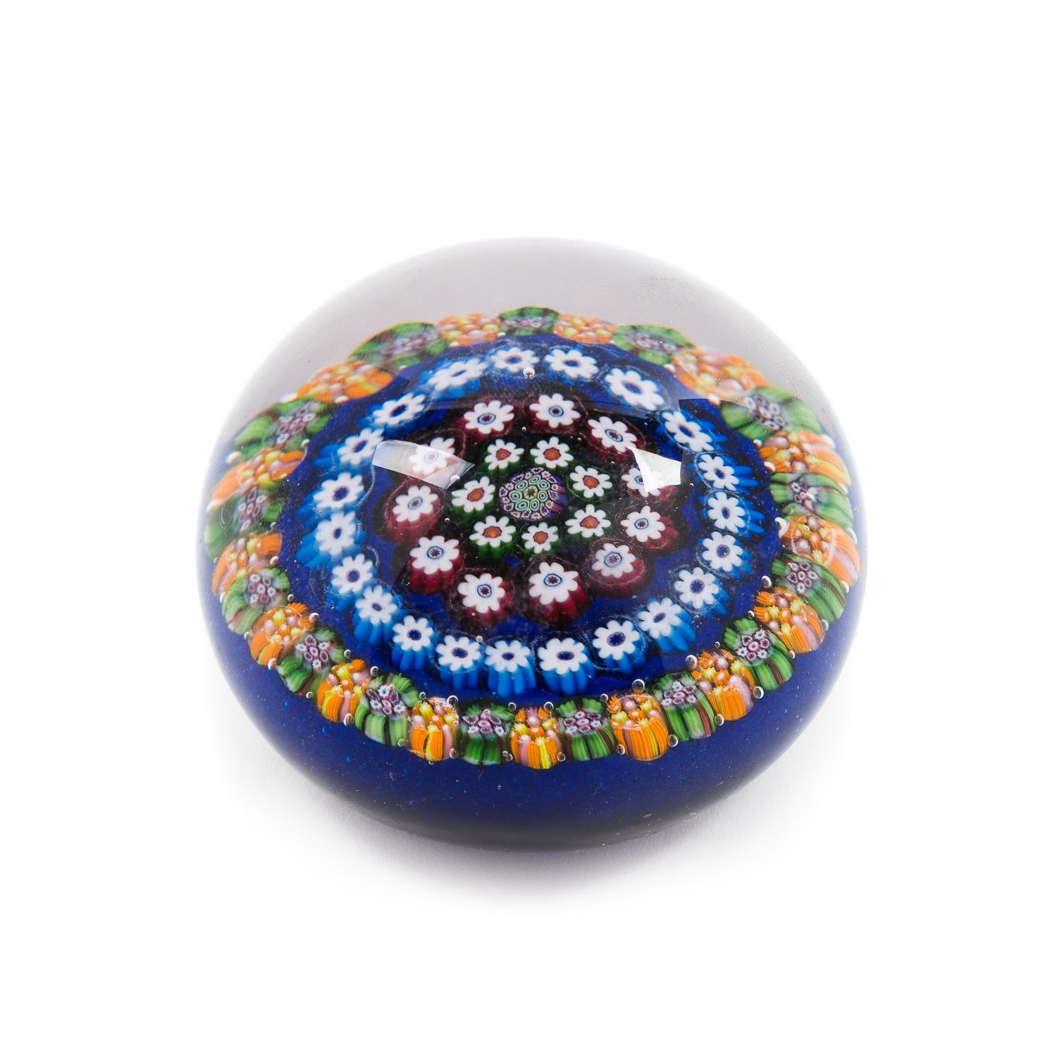 Attributed to Paul Ysart, (Spanish, 1904-1991), a concentric millefiori blue-ground paperweight