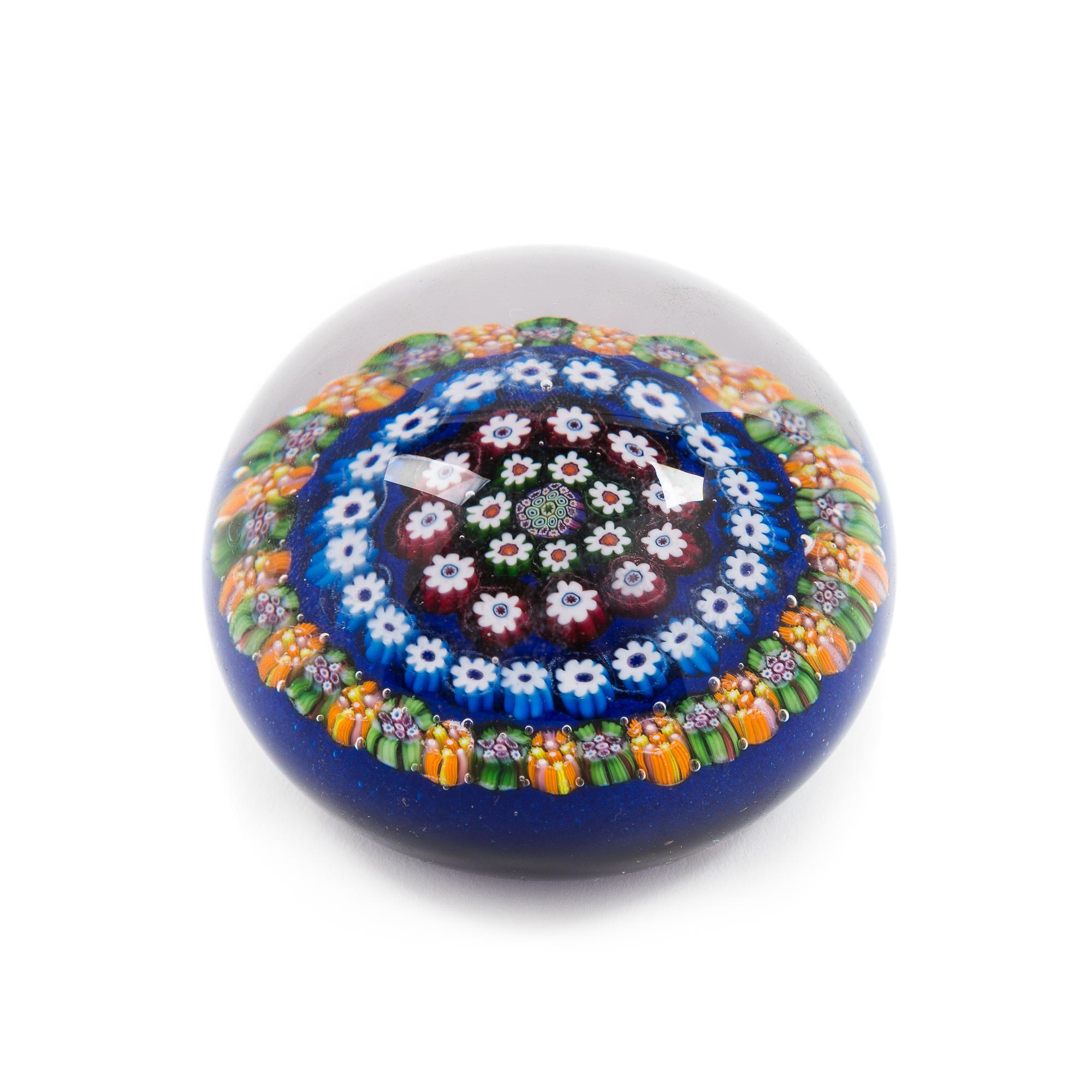 Attributed to Paul Ysart, (Spanish, 1904-1991), a concentric millefiori blue-ground paperweight