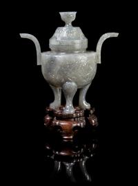 A Chinese Carved Jade Tripod Censer EARLY 20TH CENTURY Height with stand 7 1/2 x width at handles 6 inches. — EARLY 20TH CENTURY