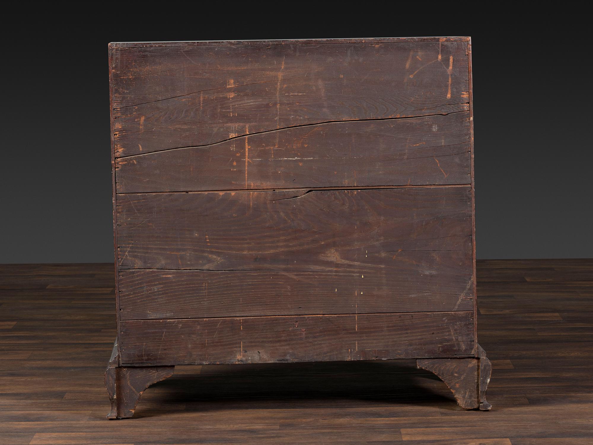 A Chippendale Figured and Shell-Carved Mahogany Slant Front Desk