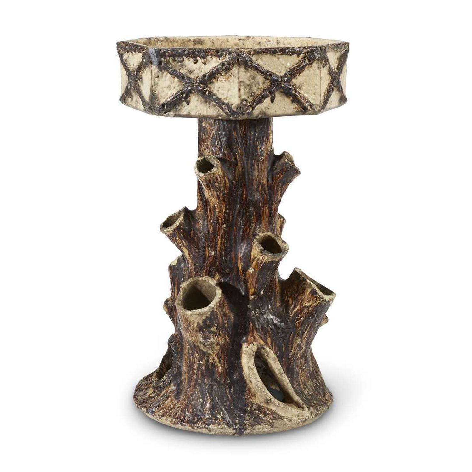 A pair of Victorian stoneware stump-form planters circa 1880