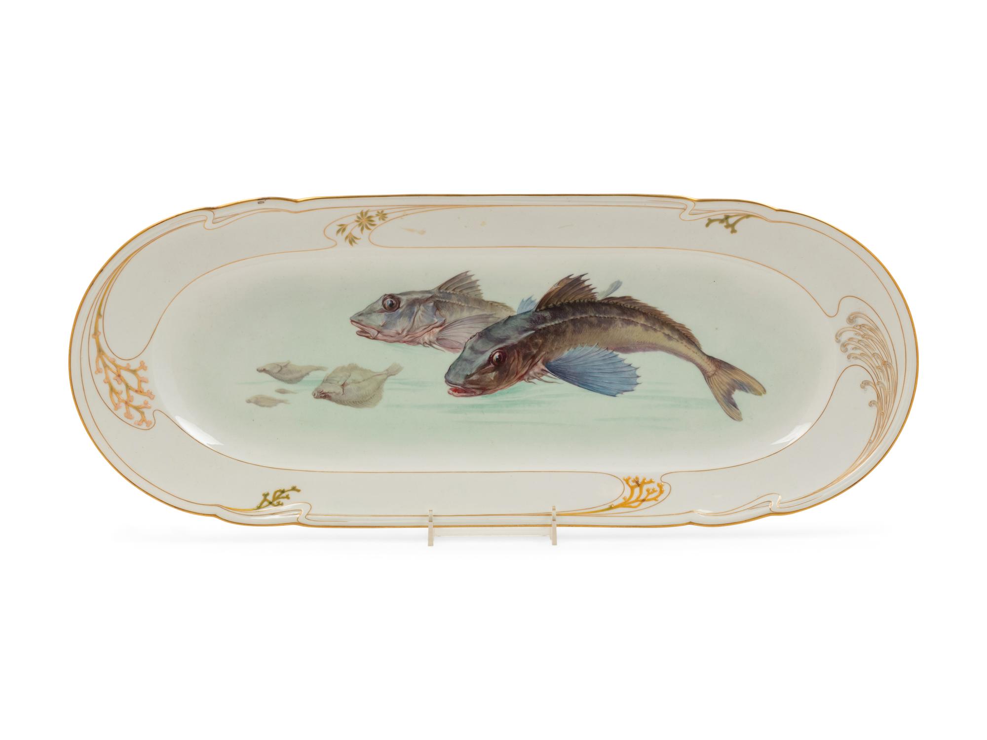 A Berlin (K.P.M.) Painted and Parcel Gilt Porcelain Fish Platter