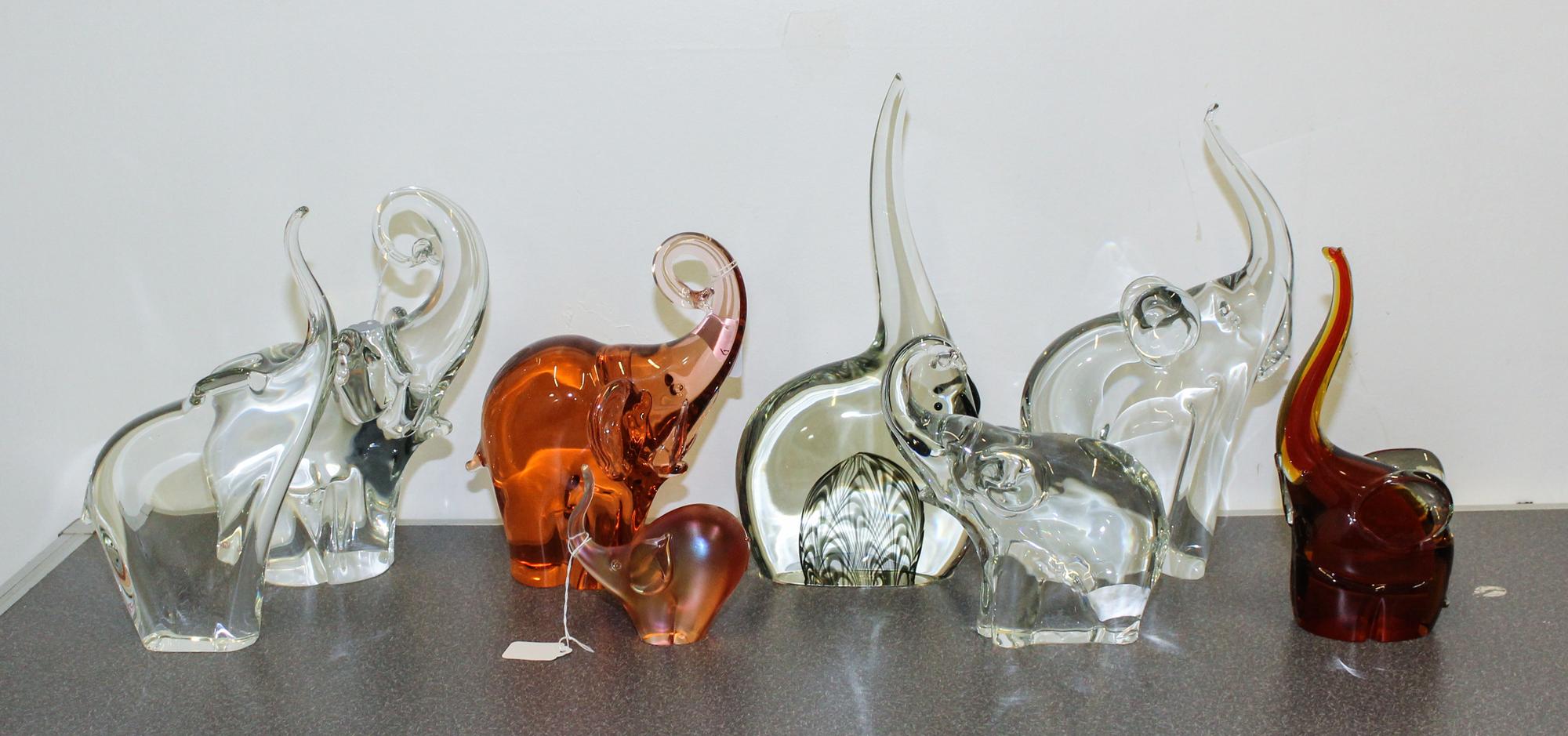 A Group of Eight Glass Elephant Figures Height of tallest 14 1/4 inches.