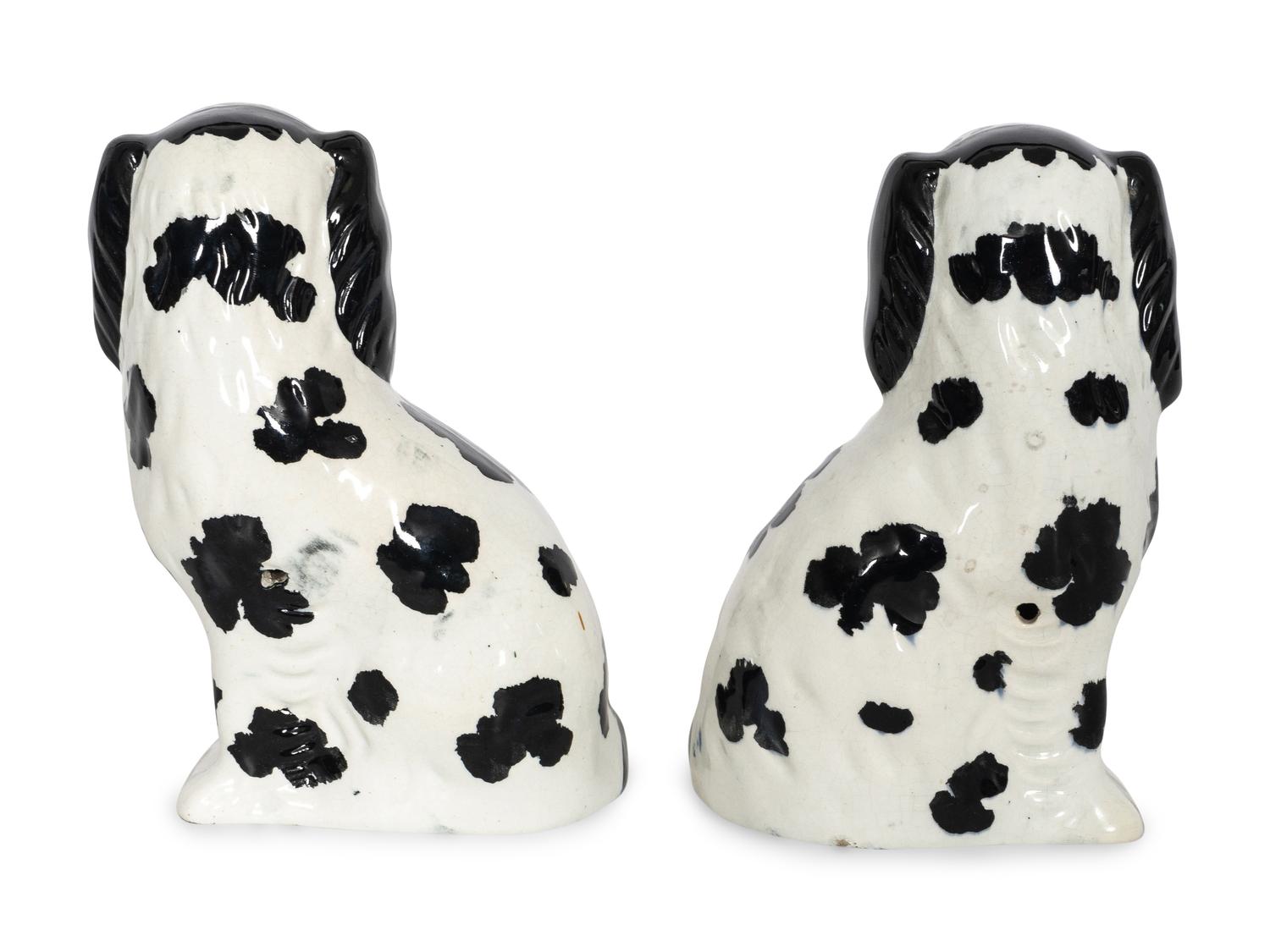 A Pair of Staffordshire Pottery Disraeli Spaniels with Floral Baskets