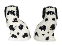 A Pair of Staffordshire Pottery Disraeli Spaniels with Floral Baskets