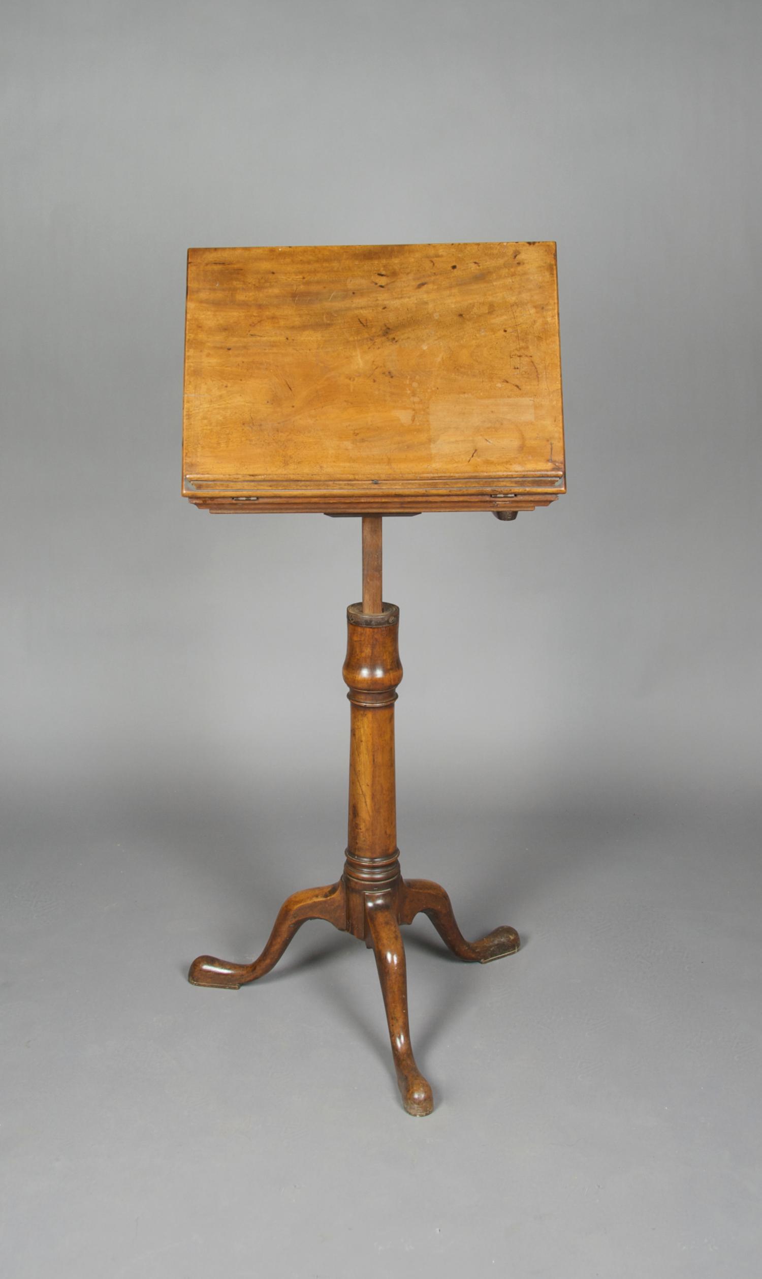 An English Walnut Reading Stand, Height 33 inches.