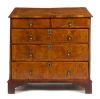 A George II Walnut Chest Height 35 1/4 x width 37 1/2 x depth 22 inches. — 18TH CENTURY