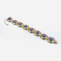 An 18K yellow gold, synthetic sapphire, and enamel bracelet