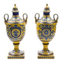 A Pair of Sevres Style Porcelain Urns Height 11 1/2 inches.