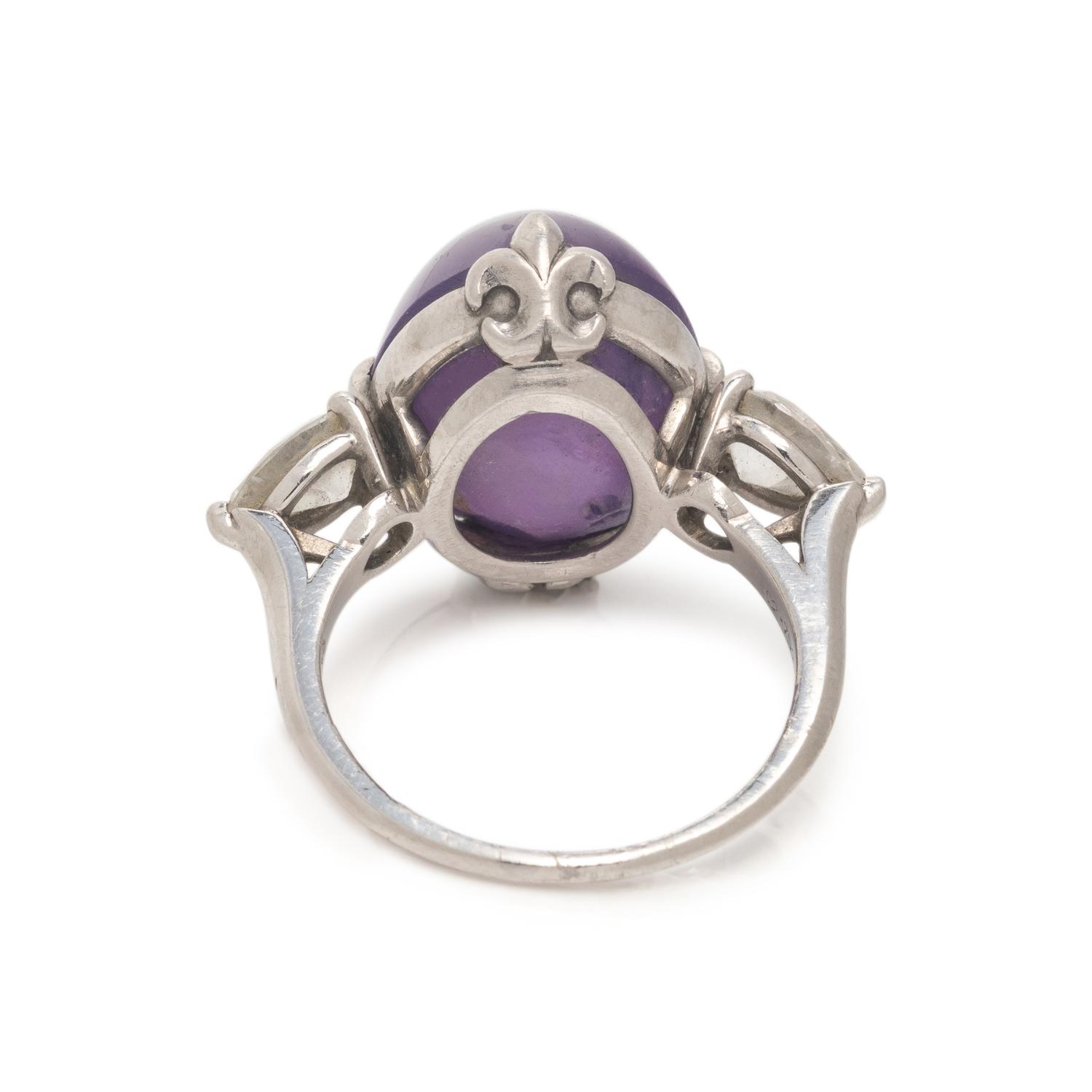 CARTIER, PURPLE COLOR CHANGE STAR SAPPHIRE AND DIAMOND RING