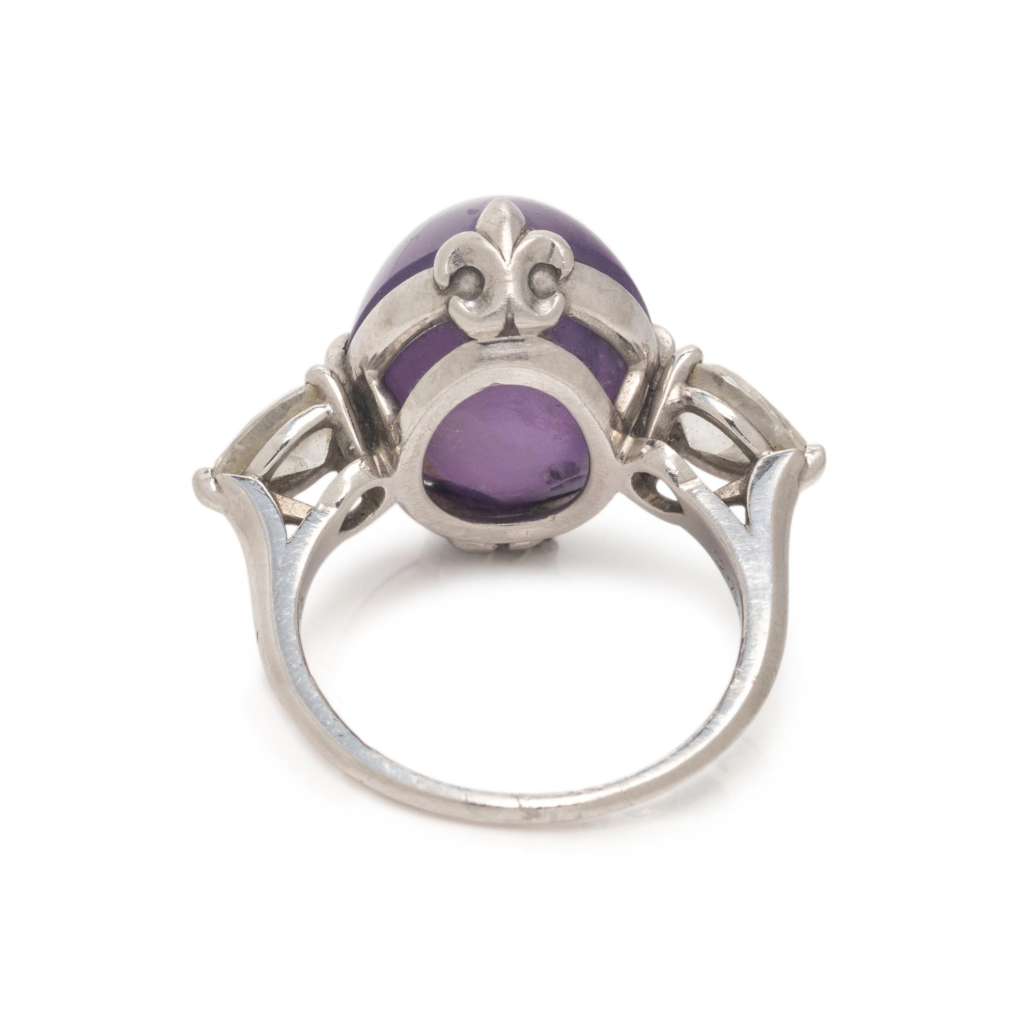 CARTIER, PURPLE COLOR CHANGE STAR SAPPHIRE AND DIAMOND RING